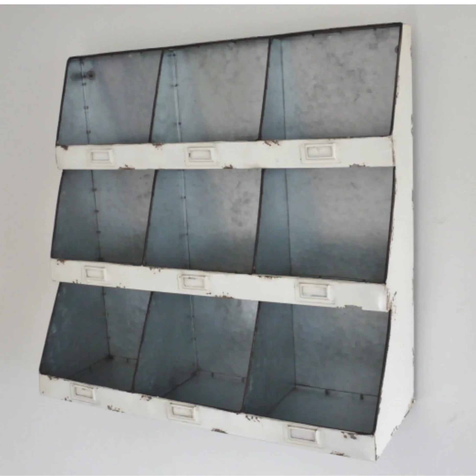 Metallic panel with a grid pattern on a white background