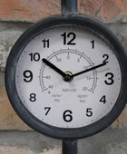 Round clock with PSI gauge against a stone wall background