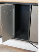 Cabinet with open doors revealing a black interior.