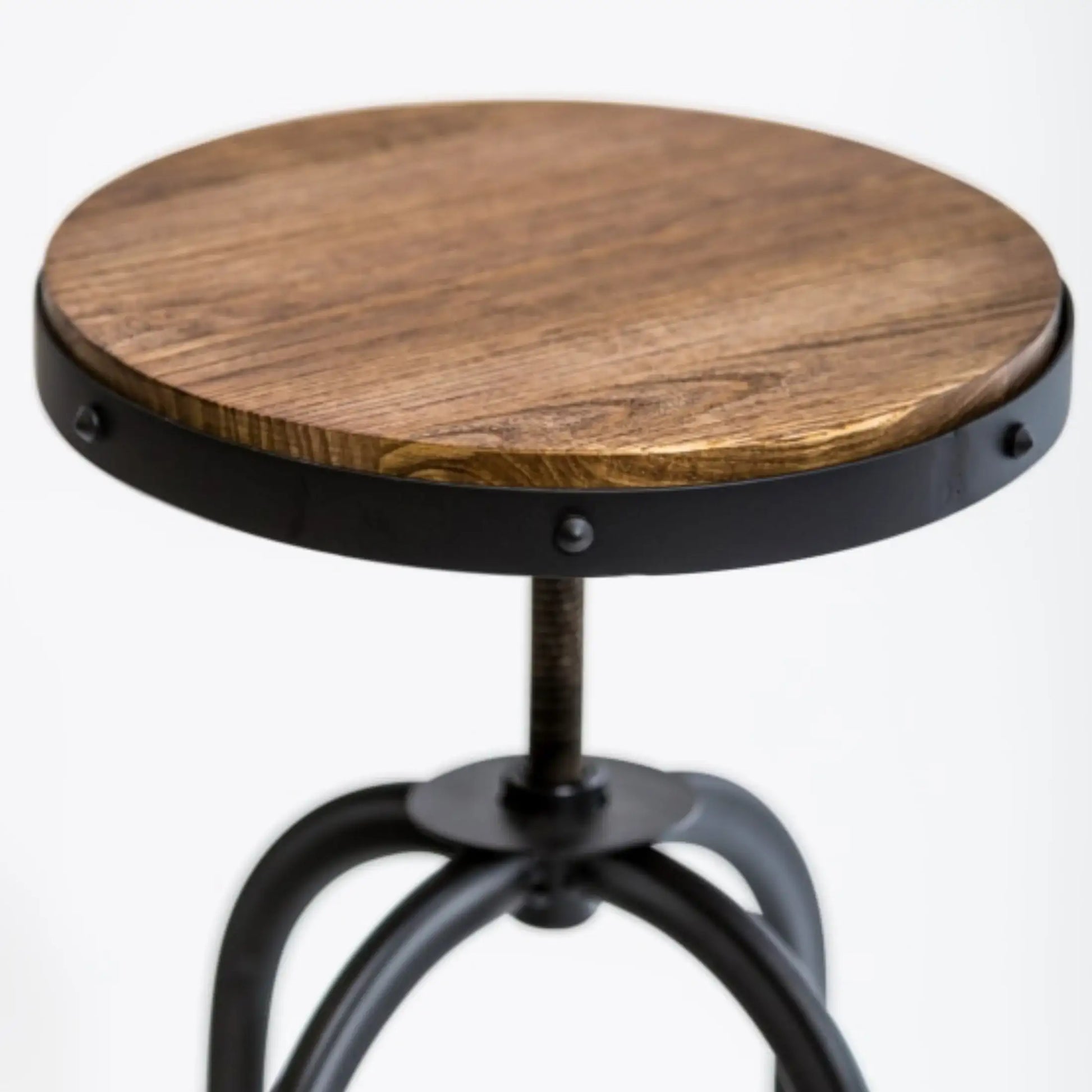 Wooden round table with metal base on a white background
