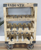 A rustic three-tier wooden rolling shelf cart made from pallet wood, featuring metal corner and wheel brackets, with black stenciled text on a light gray wall and wood floor background.