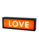 Rectangular light box with 'LOVE' text on an orange background
