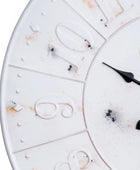Close-up of a white ceramic clock with black hands on a white background