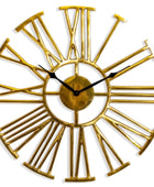 Gold wall clock with Roman numeral design on a white background
