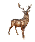 Bronze deer statue on a white background