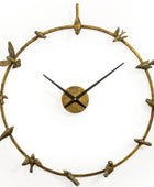 Decorative wall clock with bird design on a white background