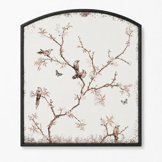 Arched framed wall art featuring a delicate bird and blossom illustration on a warm off-white background, enclosed in a thin black frame.