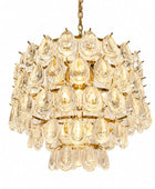 A tiered crystal chandelier with teardrop-shaped clear glass drops and a gold-toned metal frame, suspended by a chain against a plain white background.