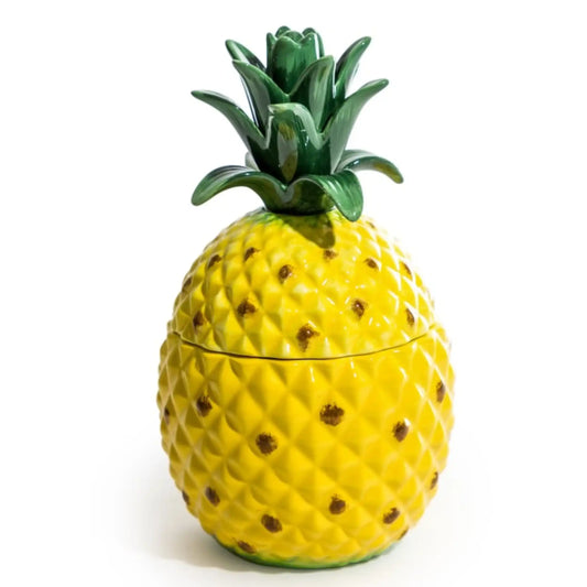 Pineapple-shaped container with a lid on a white background