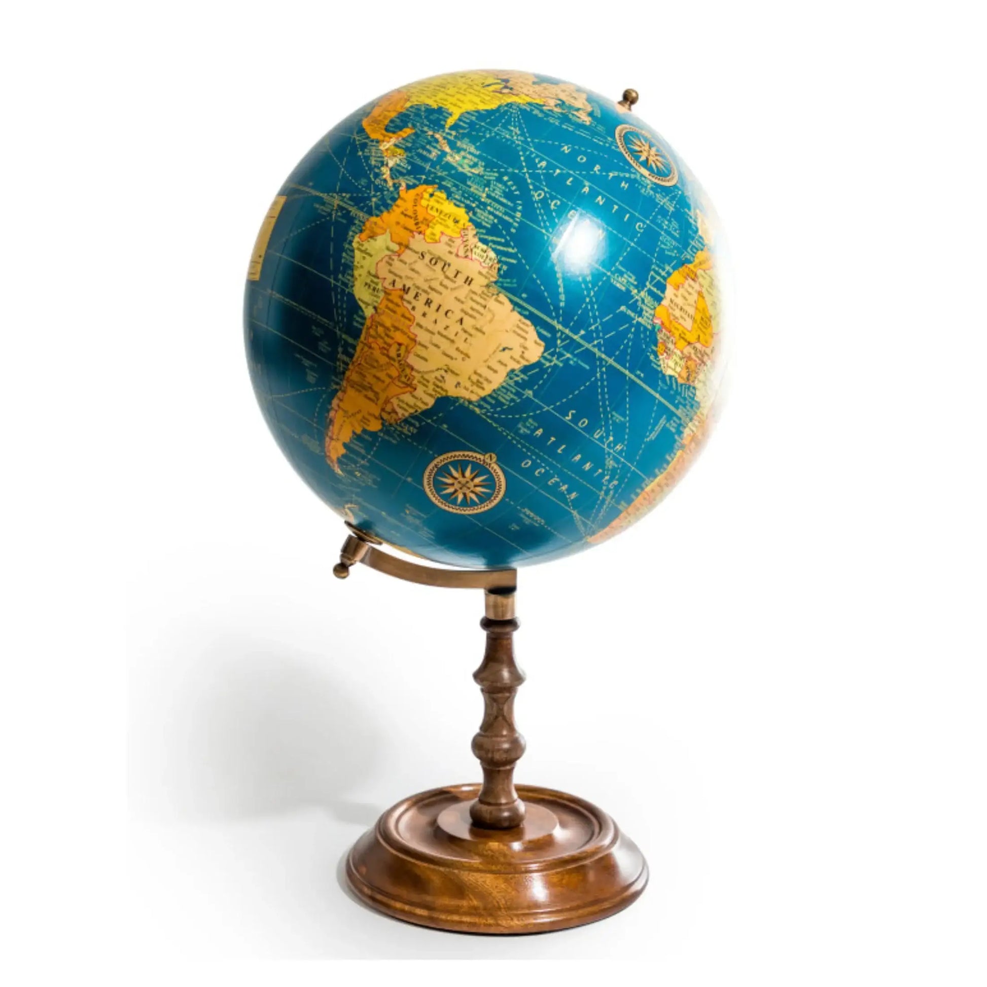 Vintage-style globe on a stand with a white background
