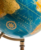 Close-up of a vintage-style globe with a wooden stand