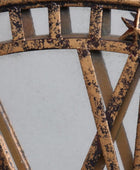 Close-up of a rusted metal gate with star design on a light gray background
