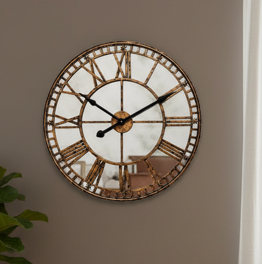 Decorative wall clock with Roman numeral markers on a plain wall.
