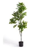 Artificial potted plant with green leaves on a white background