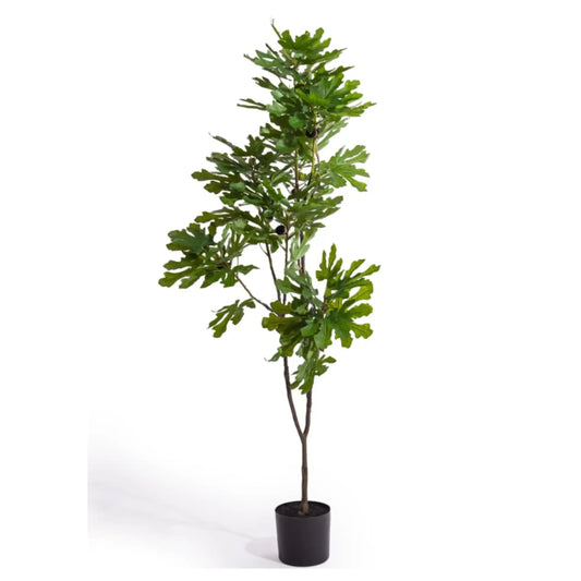 Artificial potted plant with green leaves on a white background