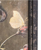 Butterfly on a branch with a dark, textured border