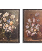 Two framed paintings of floral arrangements on a white background
