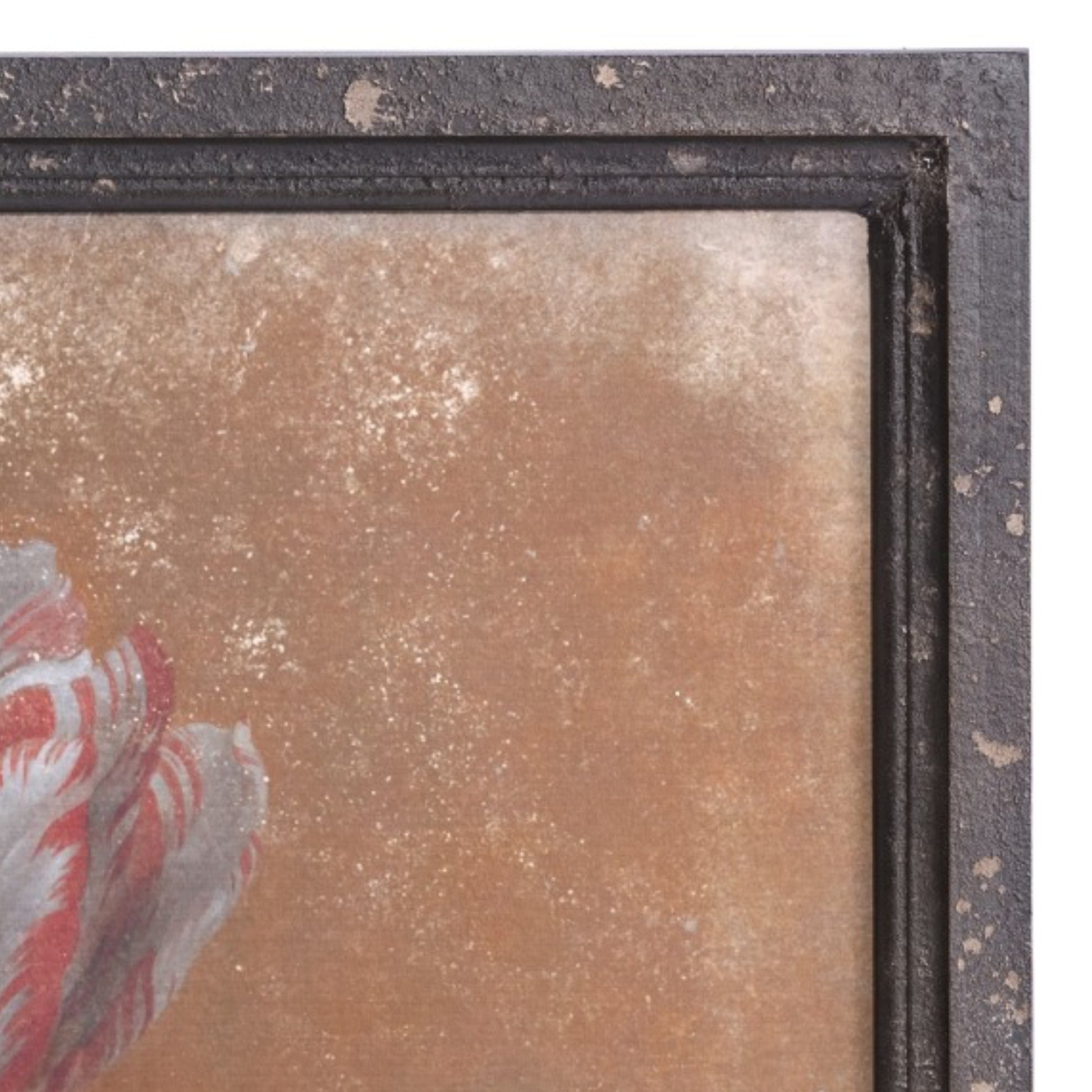 Close-up of a textured surface with a decorative element, possibly from a painting or artwork.