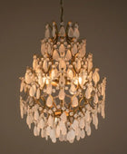 Decorative chandelier with crystal elements on a dark background