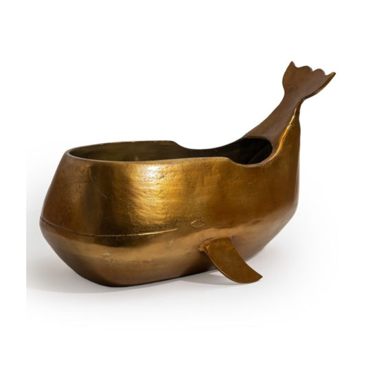 Bronze whale-shaped container on a white background