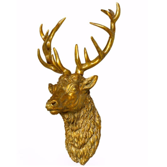 Gold deer head wall decoration on a white background