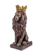 A bronze-finished lion statue with a detailed golden crown, sitting on a rectangular base against a plain white background.