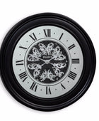 Decorative wall clock with black frame and silver gears on a white background