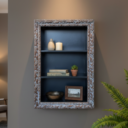 Decorative wall shelf with various items against a neutral wall