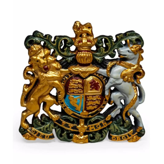 Decorative emblem with gold, green, and white colors on a white background