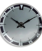 Round wall clock with black and silver design on a white background