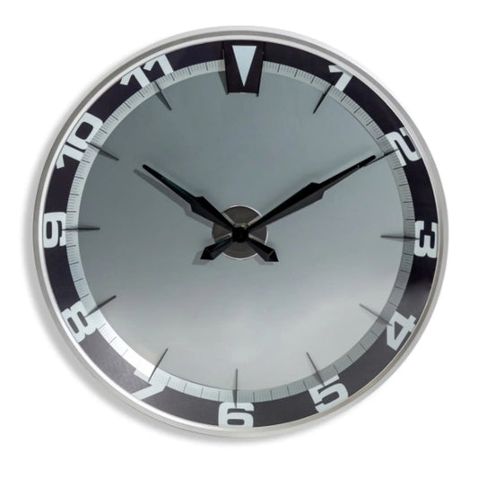 Round wall clock with black and silver design on a white background