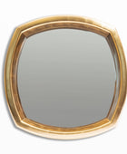 Gold-framed mirror on a white background