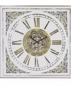 Decorative wall clock with Roman numerals and intricate design on a white background