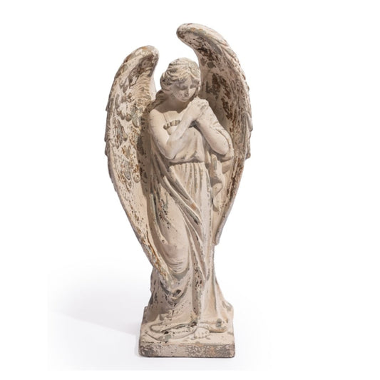 Statue of an angel with closed eyes and hands clasped, on a white background