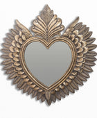 Decorative wall mirror with heart shape and floral design on a white background