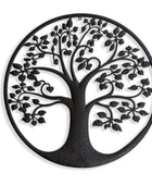Black metal tree of life wall art on a white background