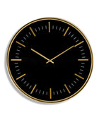 Black wall clock with gold accents on a white background