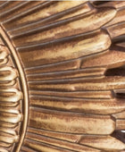 Close-up of a metallic gear with detailed teeth