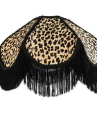Leopard print top with black fringes on a white background