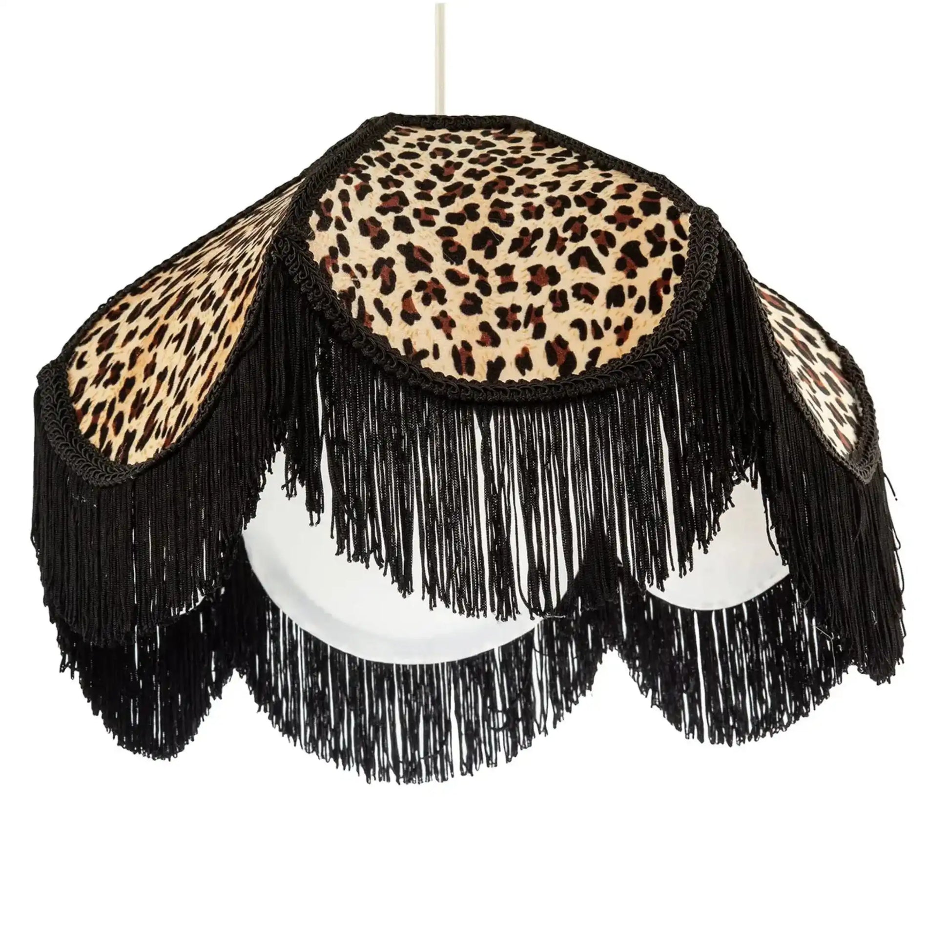 Leopard print lampshade with black fringes on a white background