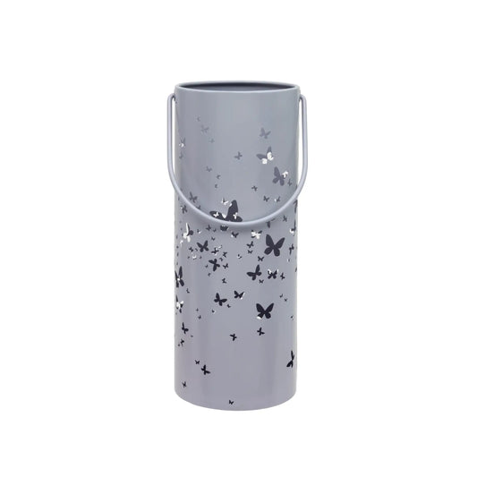 Gray cylindrical lantern with butterfly patterns on a white background