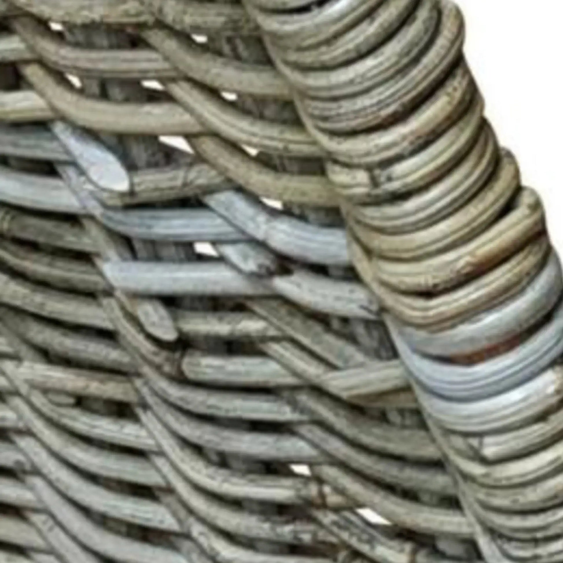 Close-up of woven rattan chair with natural brown tones