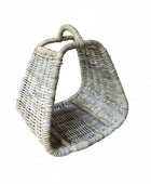 Woven basket with handles on a white background