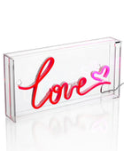 Neon sign with 'love' and heart design in a clear box on a white background