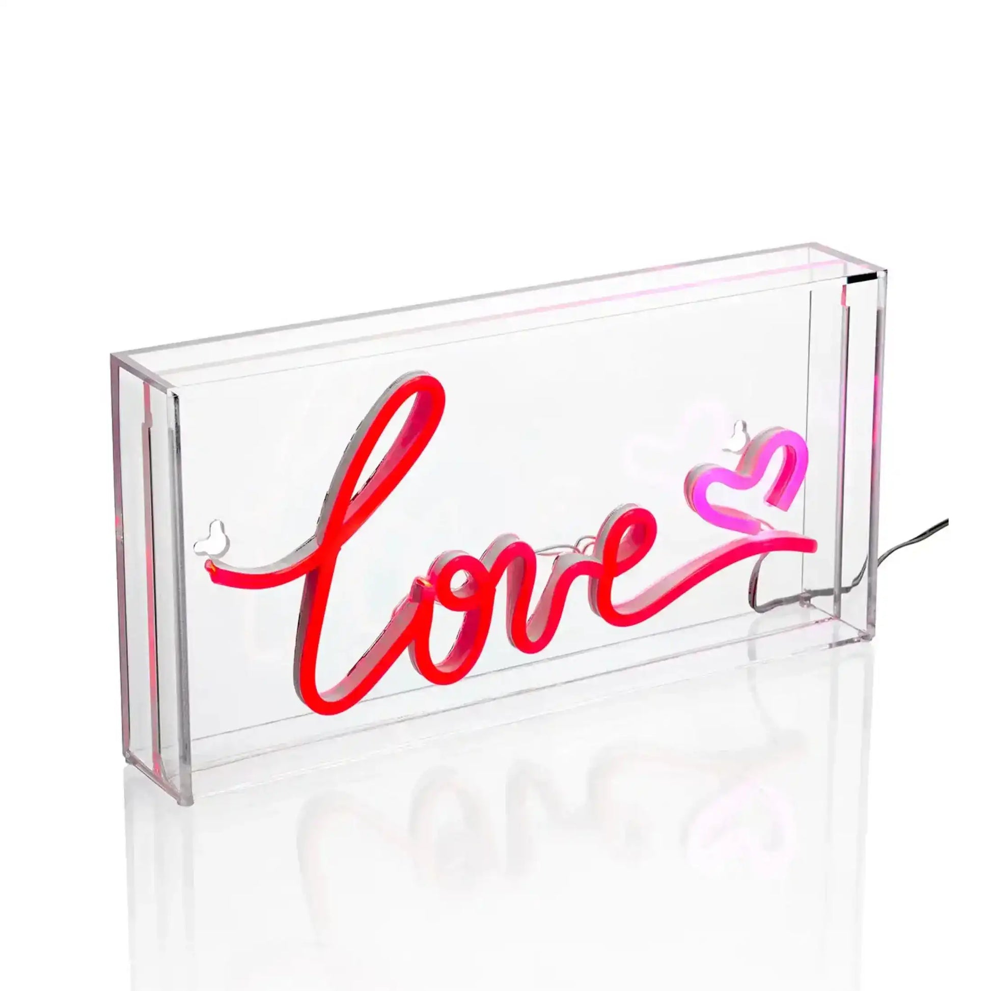Neon sign with 'love' and heart design in a clear box on a white background