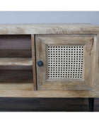 Wooden console table with a decorative metal grille on a plain background