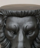 Black lion head stool with a neutral background