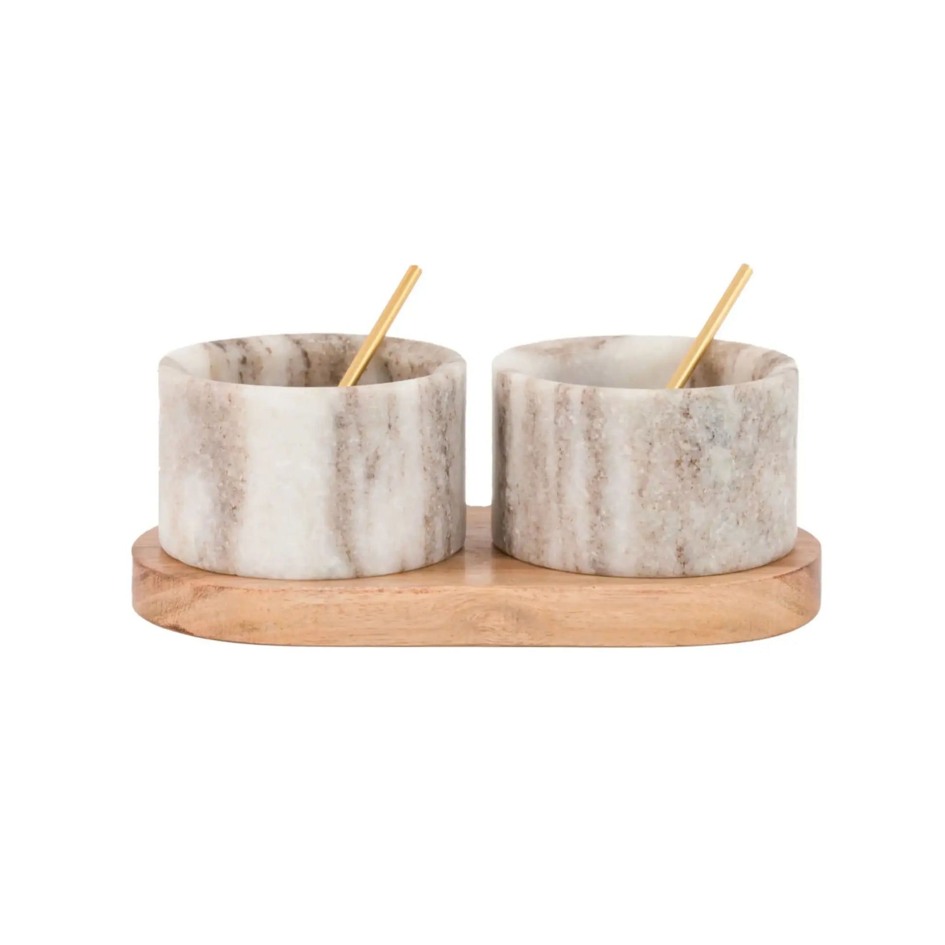 Two marble salt shakers with wooden stands on a white background