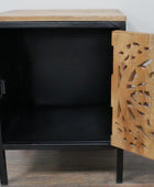 Black cabinet with a wooden top and decorative wooden side panel on a wooden floor.