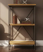 Wooden bookshelf with books and decorative items against a brown wall.